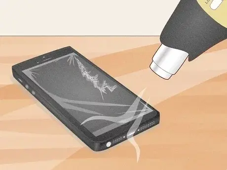 Reparar la pantalla de un iPhone Paso 3 Versión